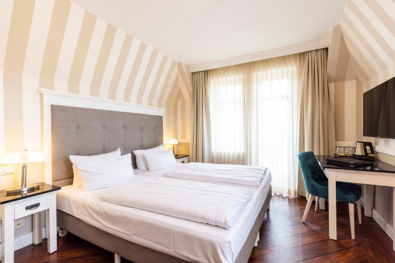 Hotel IV Jahreszeiten Кюлунгсборн Экстерьер фото