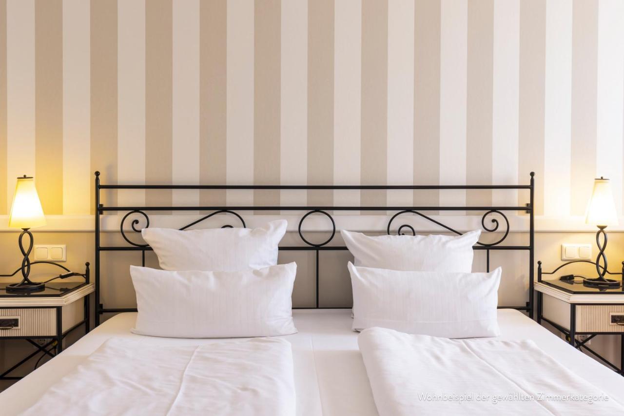 Hotel IV Jahreszeiten Кюлунгсборн Экстерьер фото