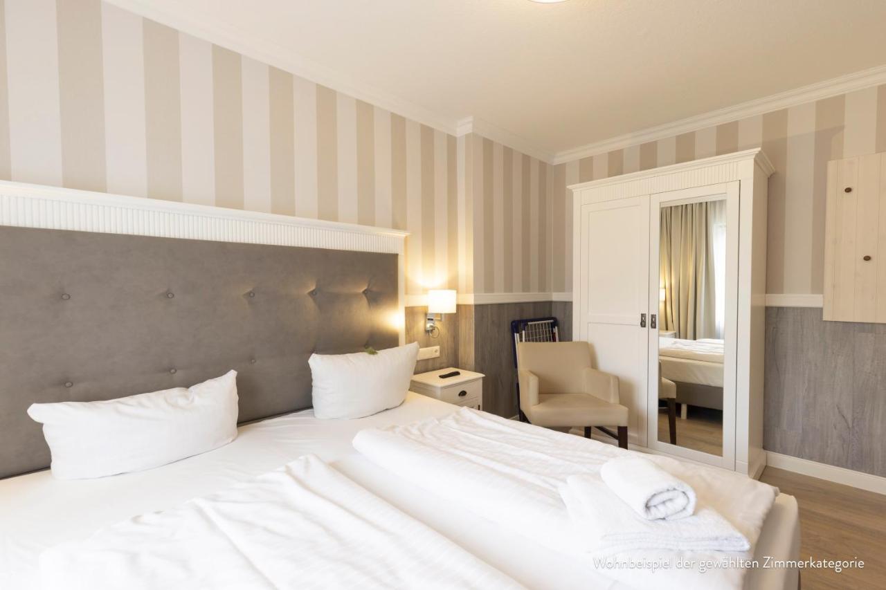 Hotel IV Jahreszeiten Кюлунгсборн Экстерьер фото